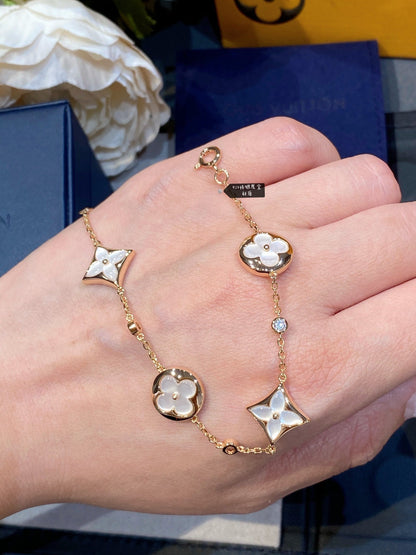 [Bloom]STAR AND SUN 4 MOTIF WHITE MOP PINK GOLD BRACELET